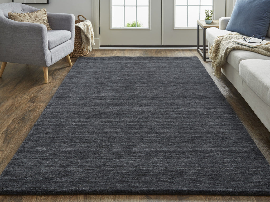 5' X 8' Black Wool Hand Woven Stain Resistant Area Rug