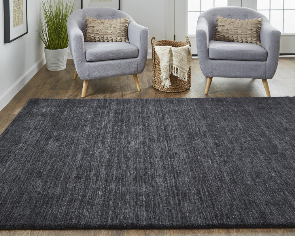 5' X 8' Black Wool Hand Woven Stain Resistant Area Rug