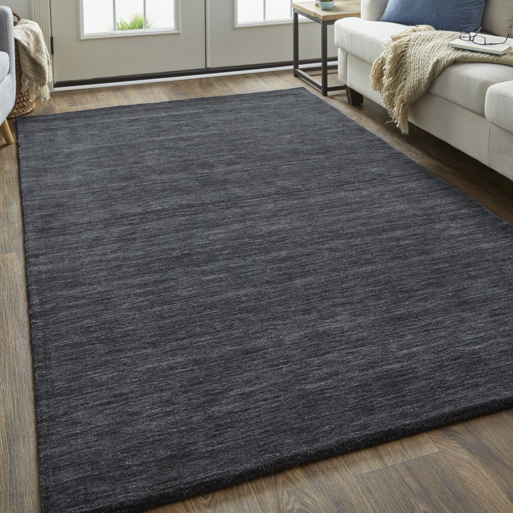 5' X 8' Black Wool Hand Woven Stain Resistant Area Rug