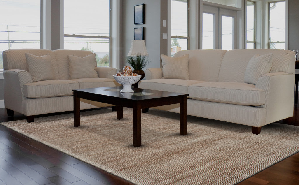 4' X 6' Tan Ivory And Taupe Hand Woven Area Rug