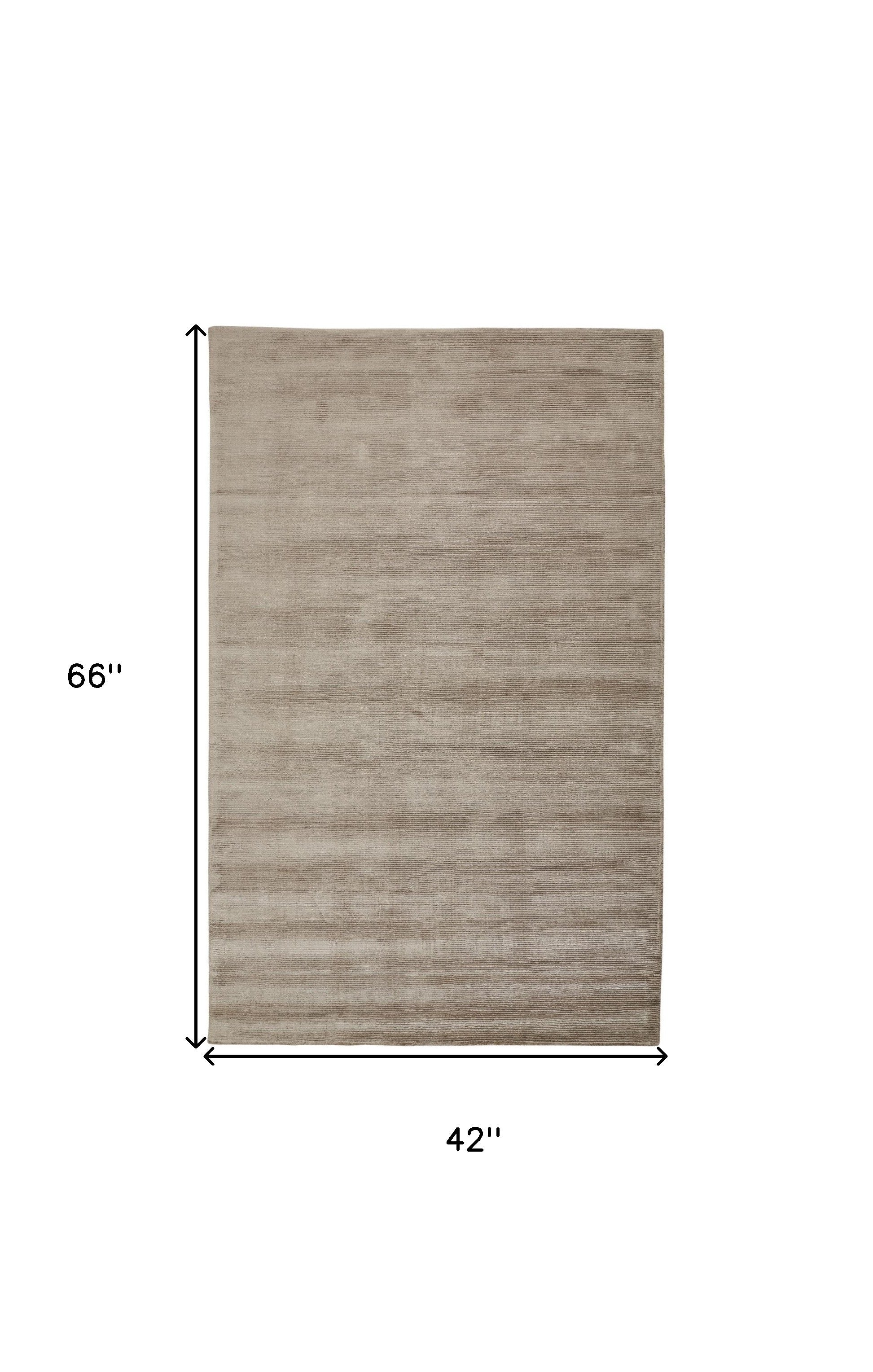 4' X 6' Tan Ivory And Taupe Hand Woven Area Rug