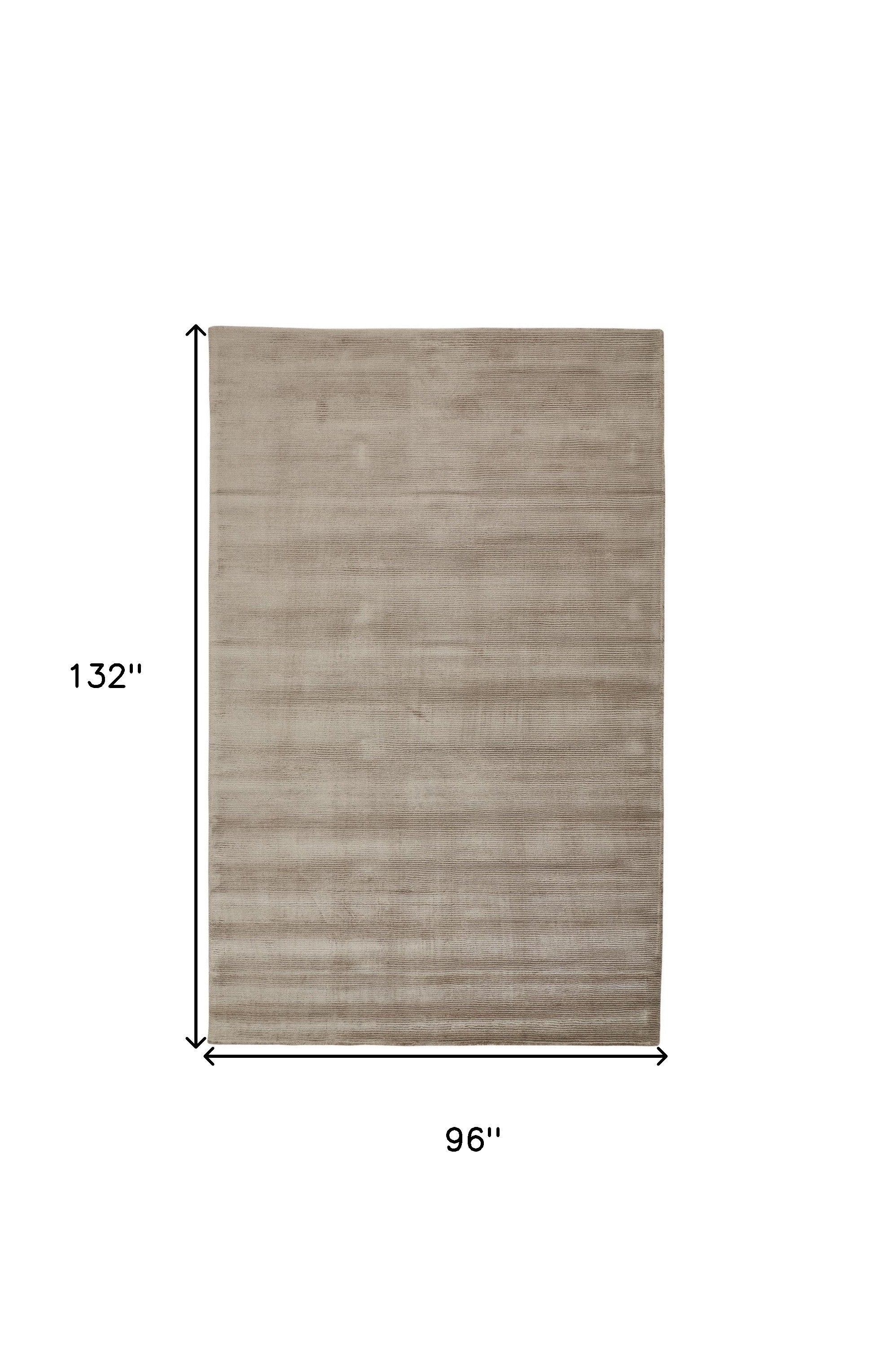 8' X 11' Tan Ivory And Taupe Hand Woven Area Rug