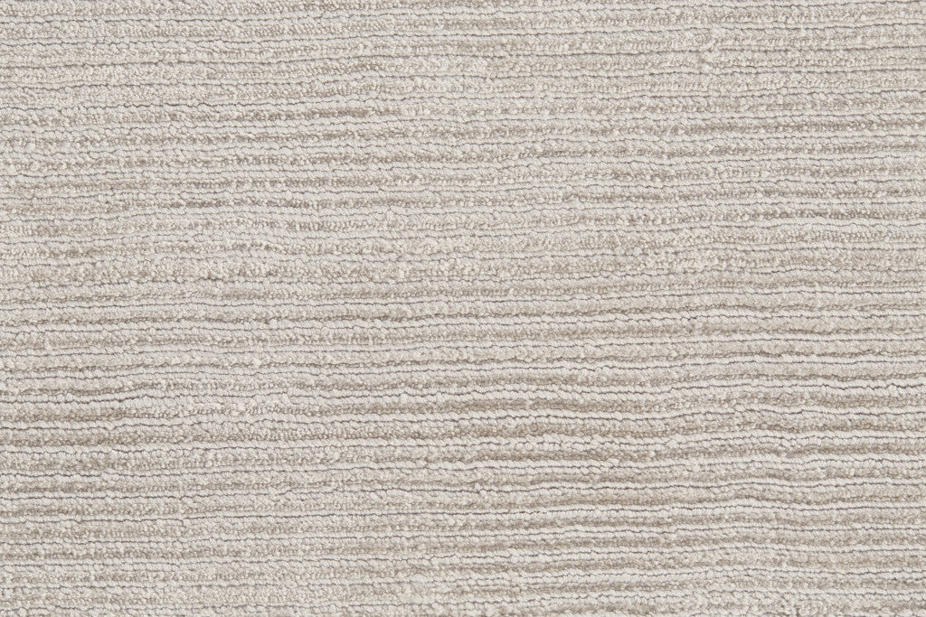 4' X 6' Ivory And Taupe Hand Woven Distressed Area Rug