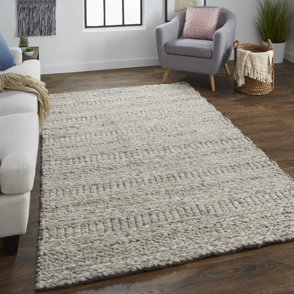 5' X 8' Ivory Gray And Tan Wool Hand Woven Stain Resistant Area Rug