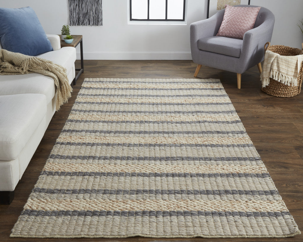 5' X 8' Ivory Tan And Gray Wool Hand Woven Stain Resistant Area Rug