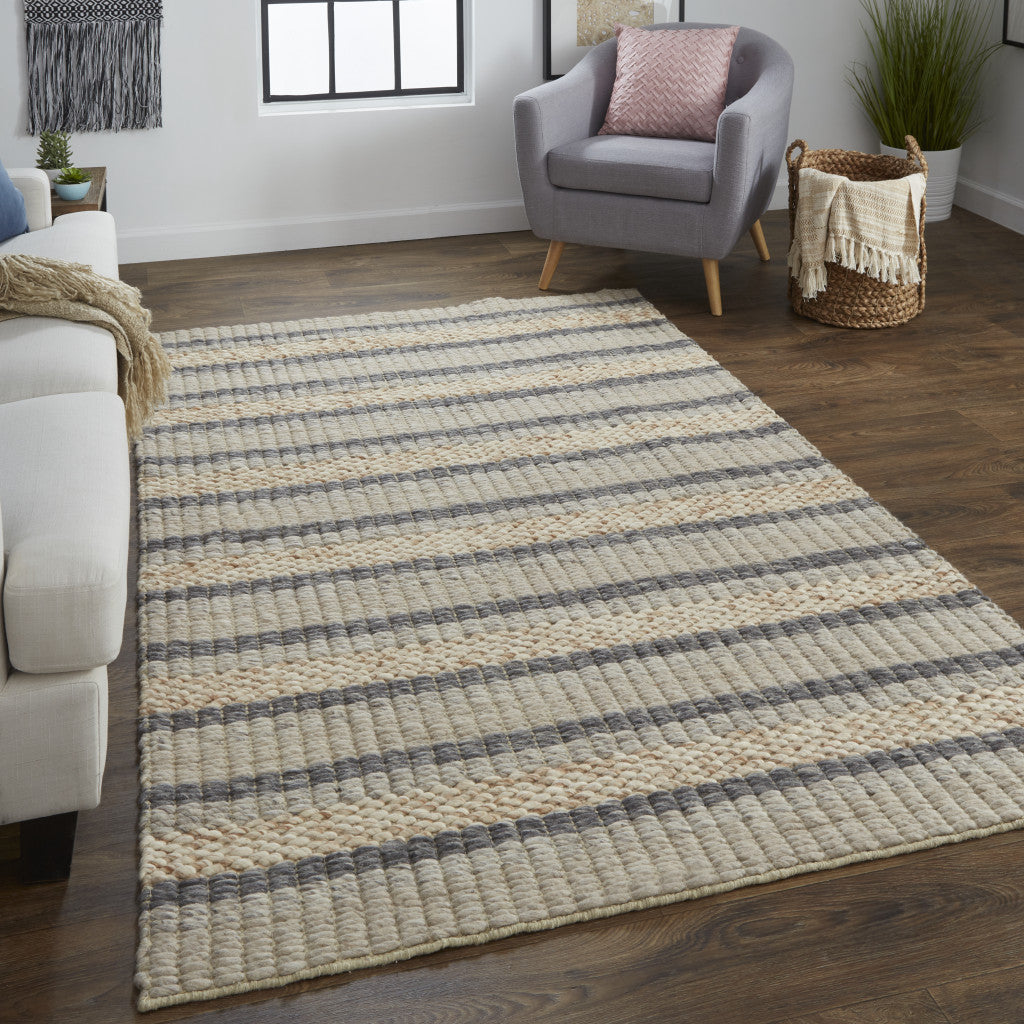 5' X 8' Ivory Tan And Gray Wool Hand Woven Stain Resistant Area Rug