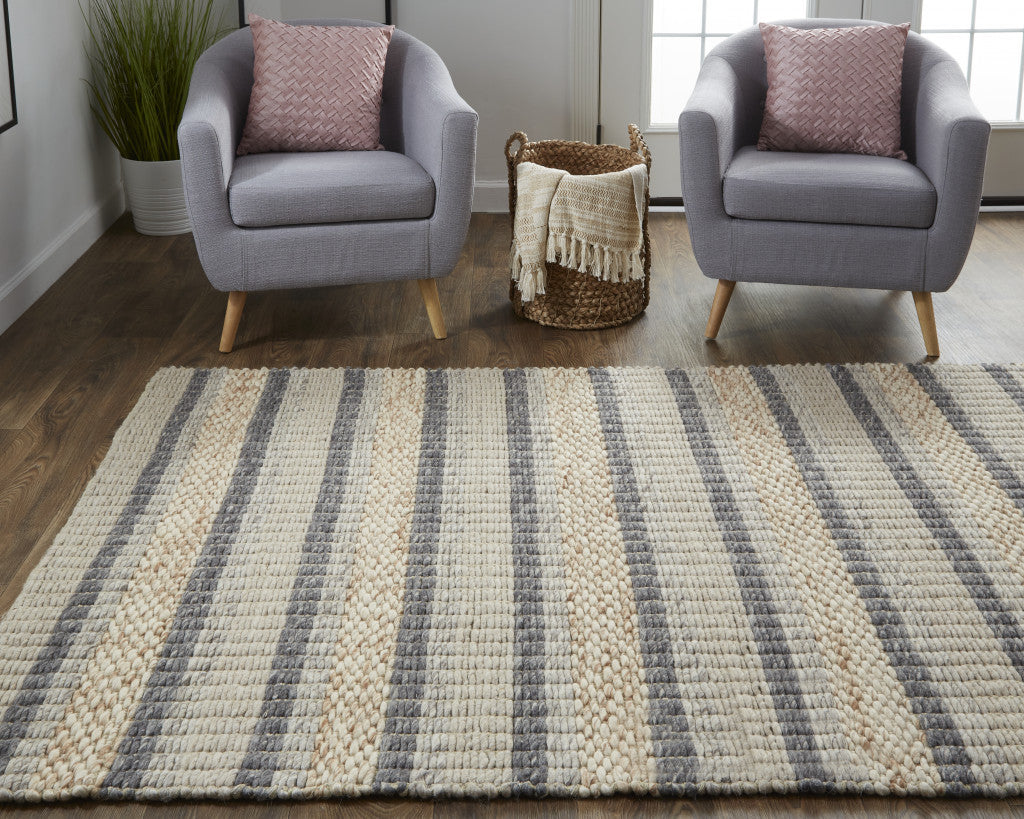 5' X 8' Ivory Tan And Gray Wool Hand Woven Stain Resistant Area Rug