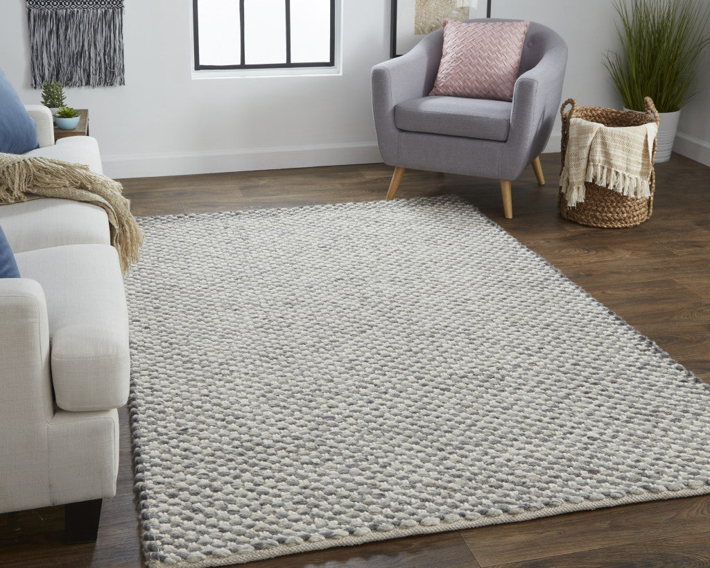 5' X 8' Gray And Ivory Wool Floral Hand Woven Stain Resistant Area Rug