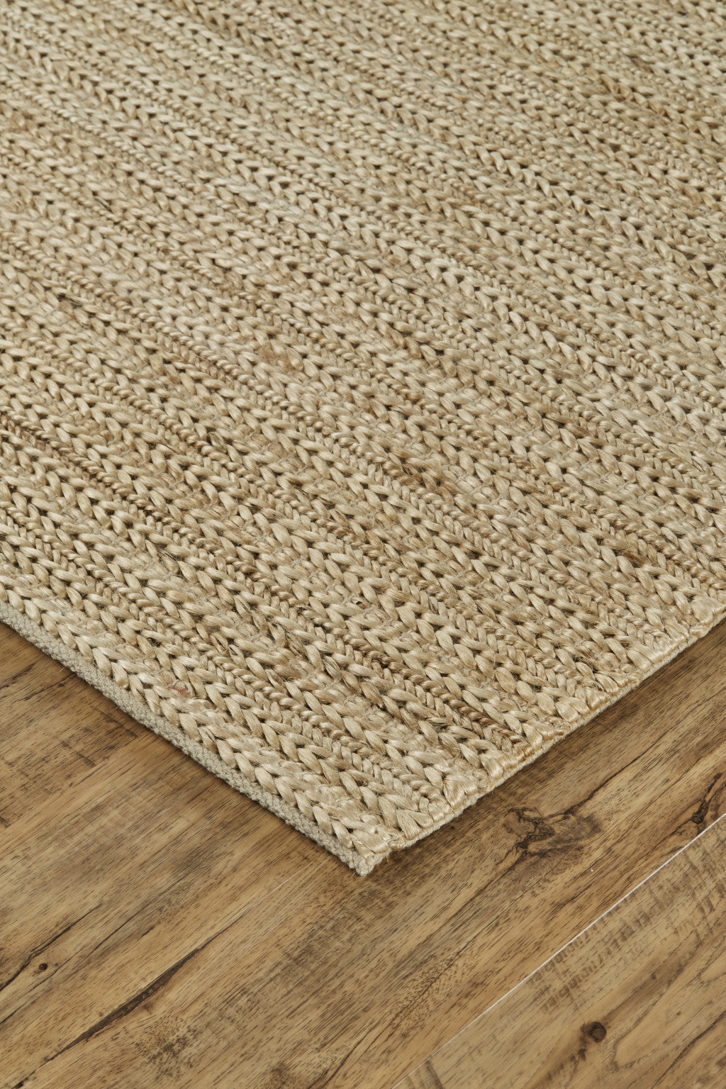 8' X 11' Tan Ivory And Taupe Hand Woven Area Rug