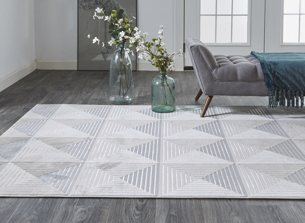 5' X 8' Beige Gray And Ivory Geometric Stain Resistant Area Rug