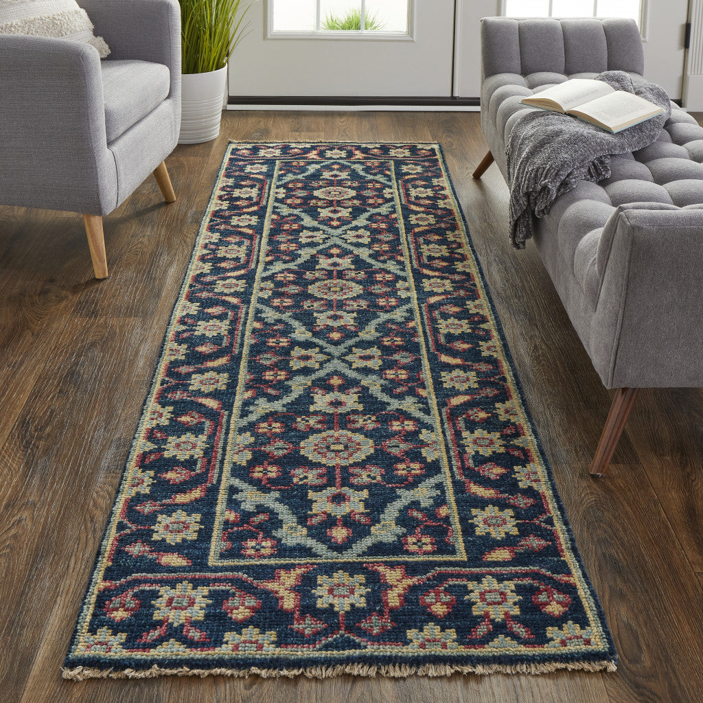 8' Blue Green And Red Wool Floral Hand Knotted Distressed Stain Resistant Runner Rug With Fringe