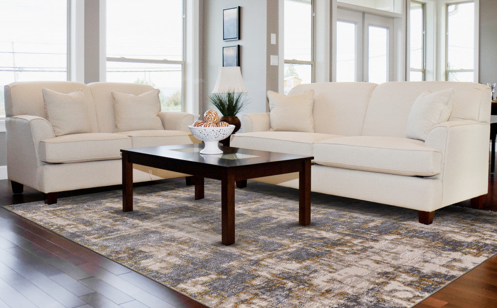 7' X 10' Gray And Gold Abstract Area Rug