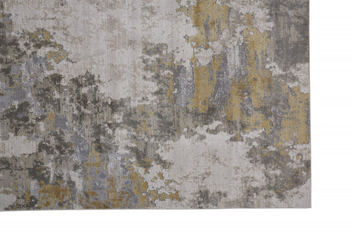 7' X 10' Ivory Gold And Gray Abstract Stain Resistant Area Rug