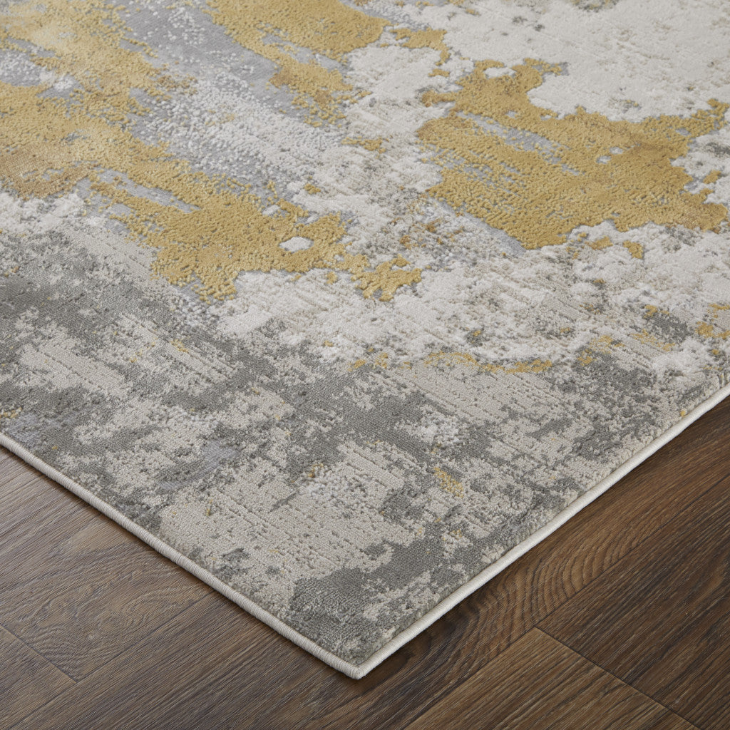 2' X 3' Ivory Gold And Gray Abstract Stain Resistant Area Rug