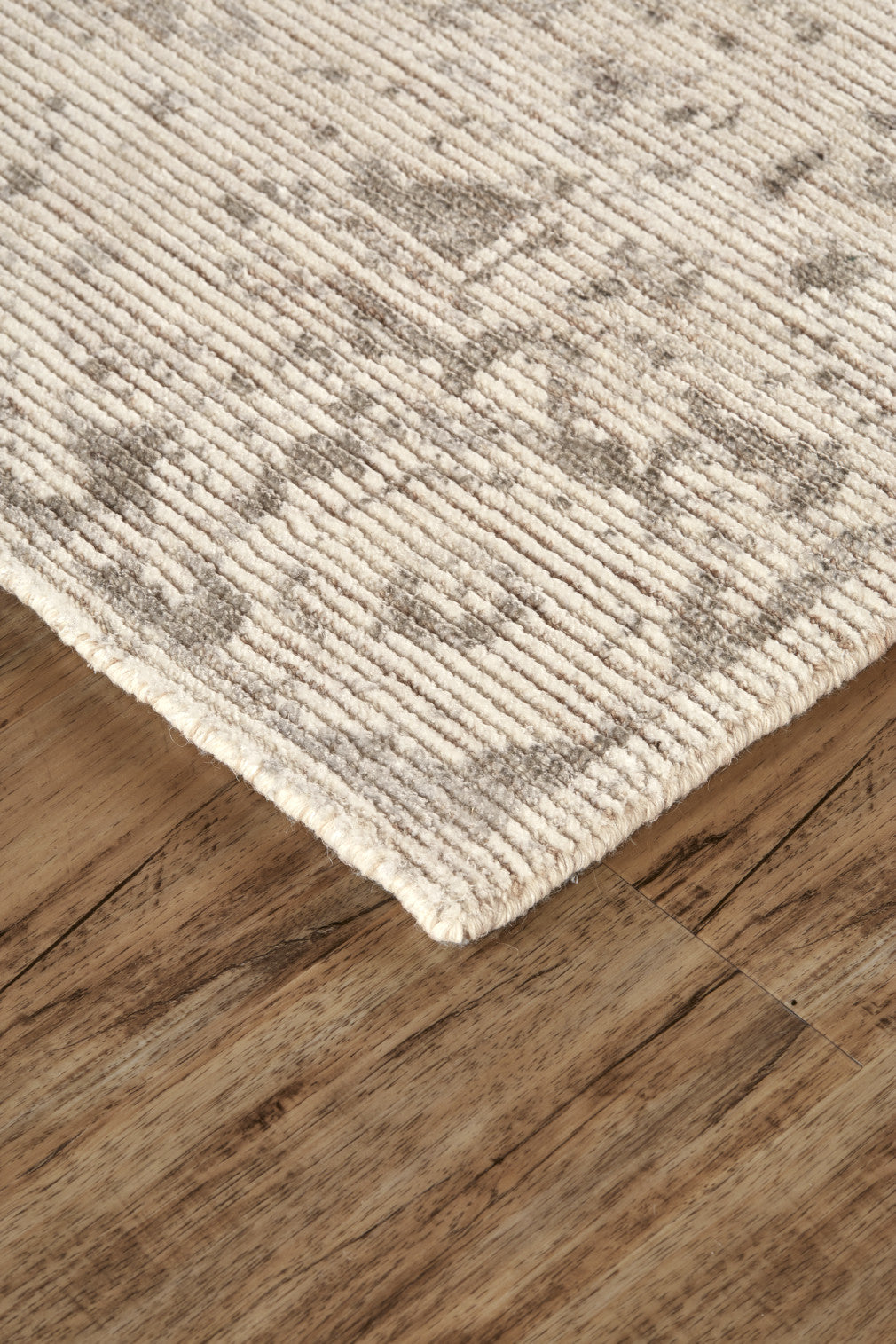 8' X 11' Ivory And Tan Abstract Hand Woven Area Rug