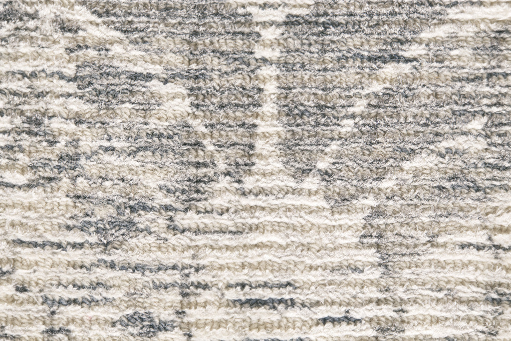 5' X 8' Ivory And Gray Abstract Hand Woven Area Rug