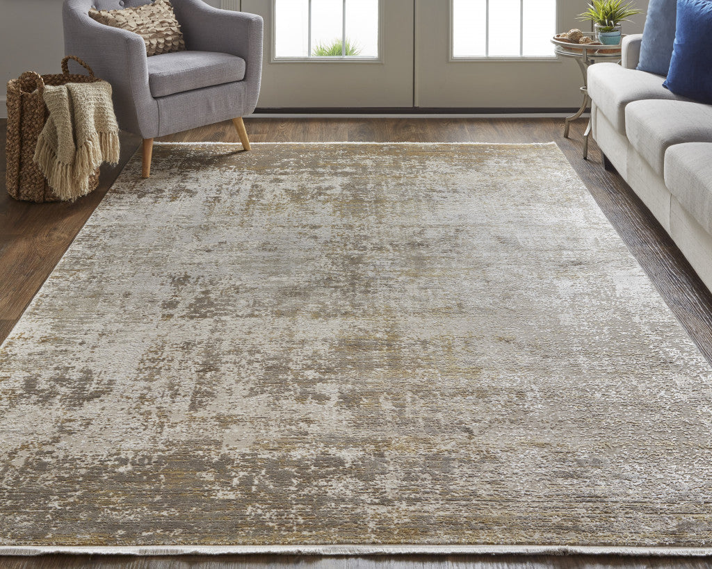 10' X 13' Taupe Ivory And Gold Abstract Area Rug With Fringe