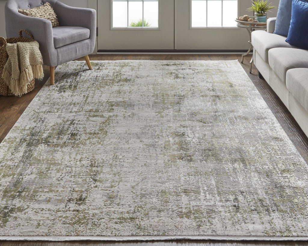 3' X 5' Green Gray And Ivory Abstract Power Loom Distressed Area Rug With Fringe