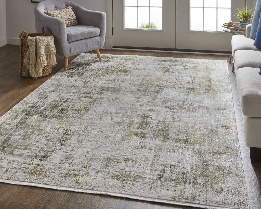 3' X 5' Green Gray And Ivory Abstract Power Loom Distressed Area Rug With Fringe