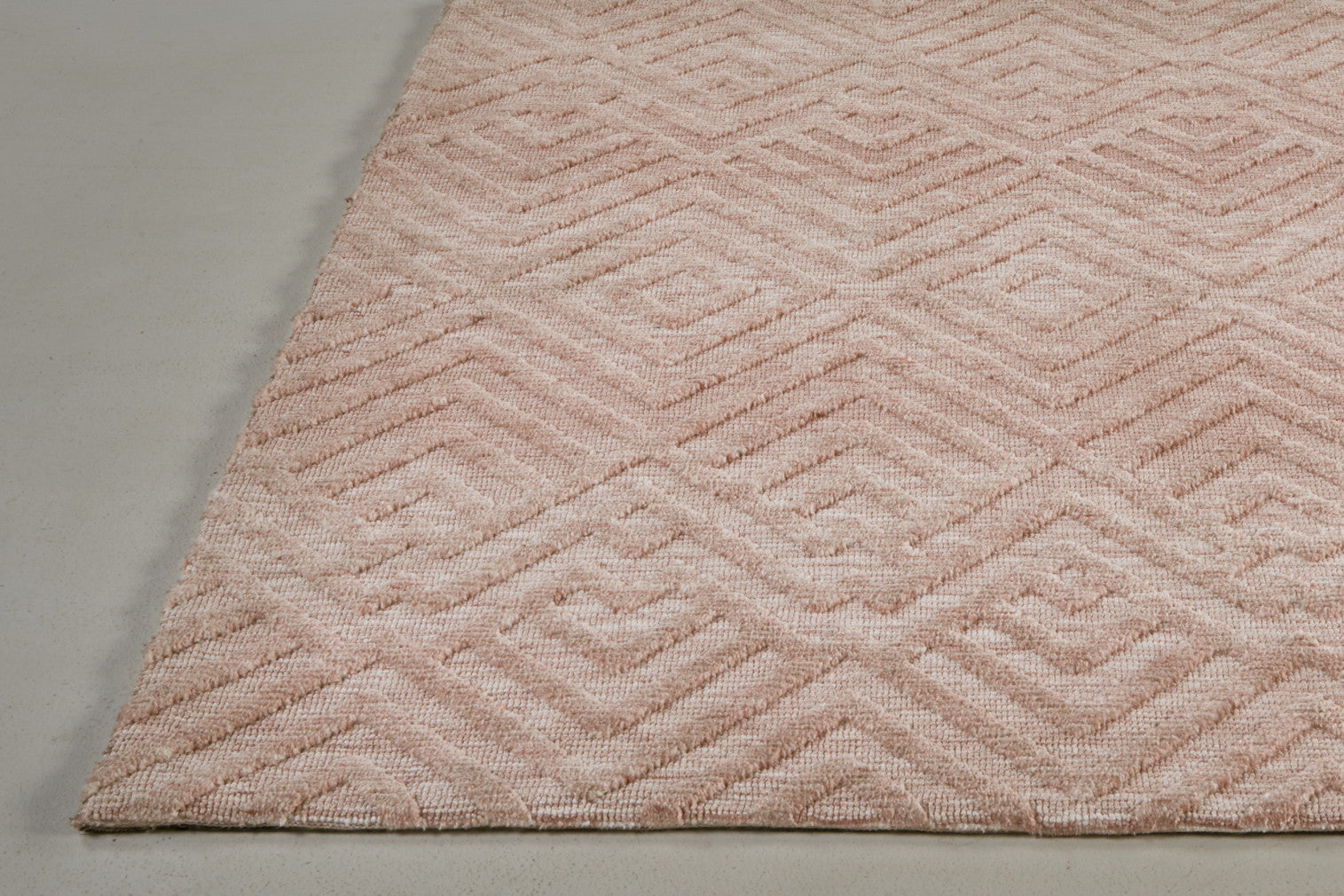 4' X 6' Pink And Ivory Geometric Stain Resistant Area Rug