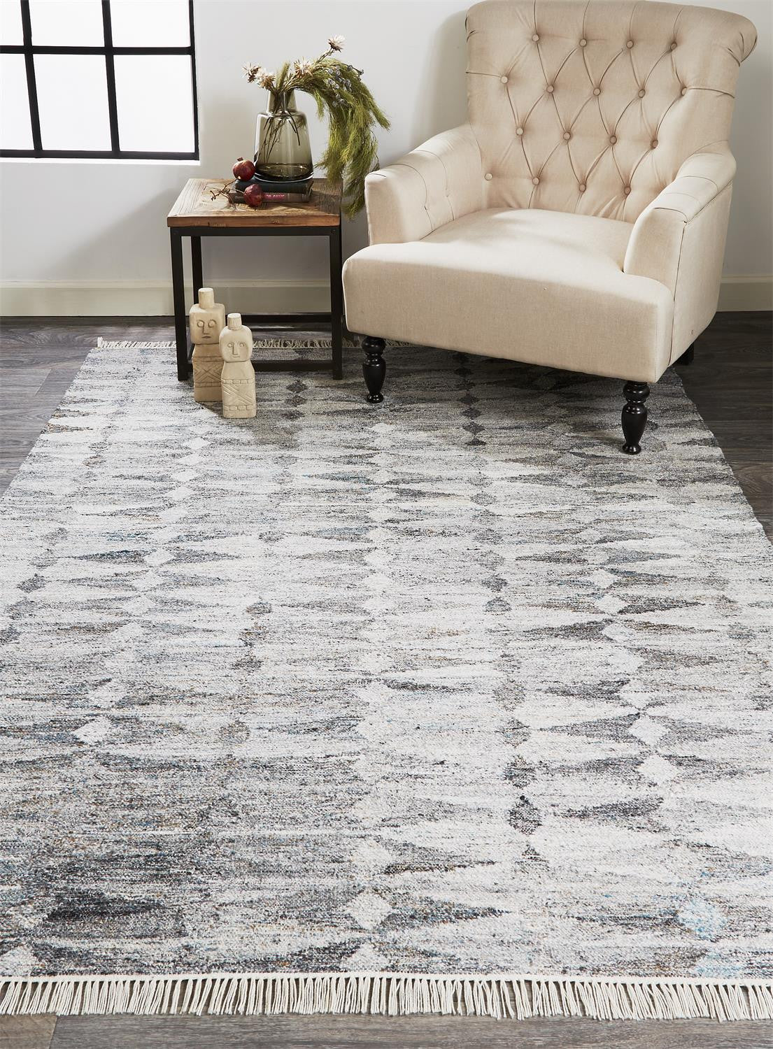 5' X 8' Gray Silver And Ivory Geometric Hand Woven Stain Resistant Area Rug With Fringe