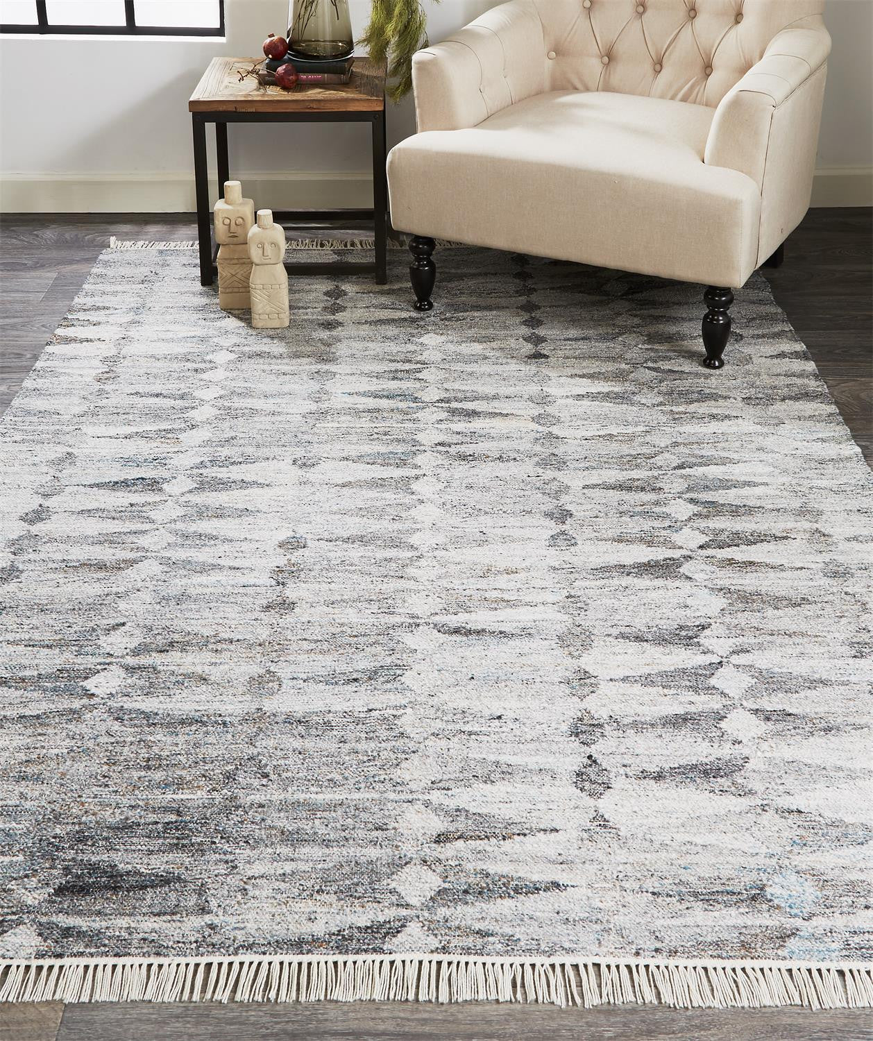 5' X 8' Gray Silver And Ivory Geometric Hand Woven Stain Resistant Area Rug With Fringe