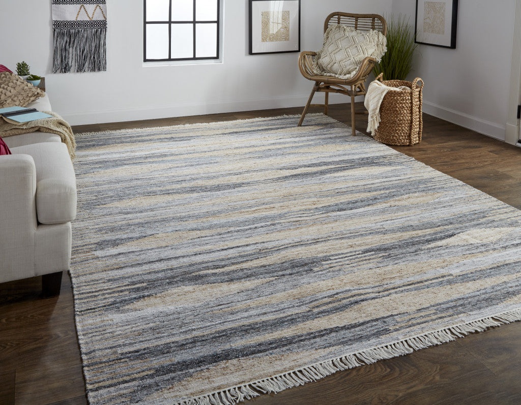 9' X 12' Gray Tan And Silver Abstract Hand Woven Stain Resistant Area Rug With Fringe