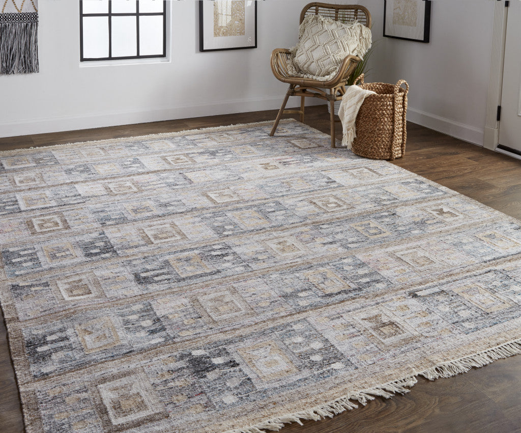 5' X 8' Gray Taupe And Tan Geometric Hand Woven Stain Resistant Area Rug With Fringe