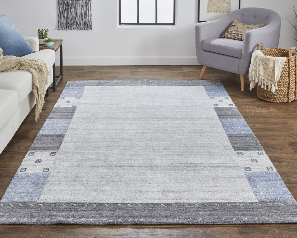 5' X 8' Gray Blue And Black Wool Hand Knotted Stain Resistant Area Rug