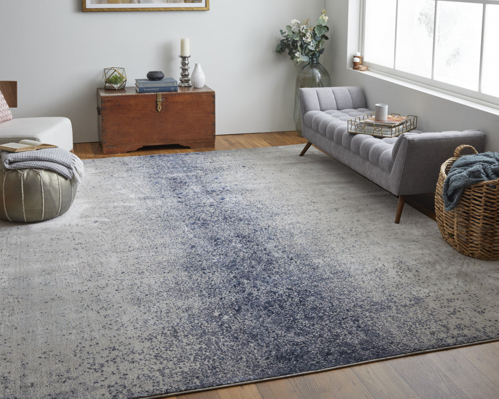 4' X 6' Ivory And Blue Abstract Power Loom Area Rug