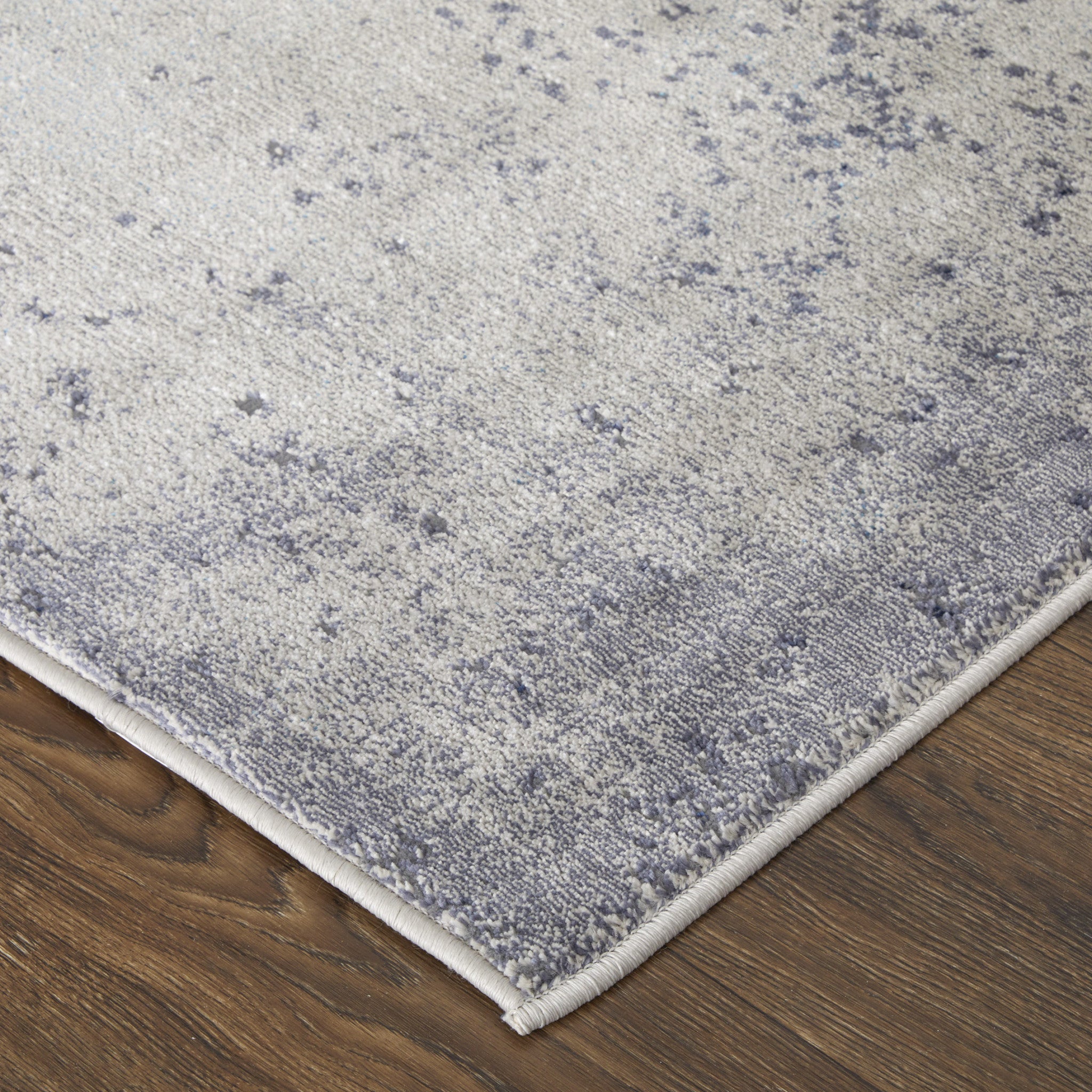 5' X 8' Ivory And Blue Abstract Power Loom Area Rug