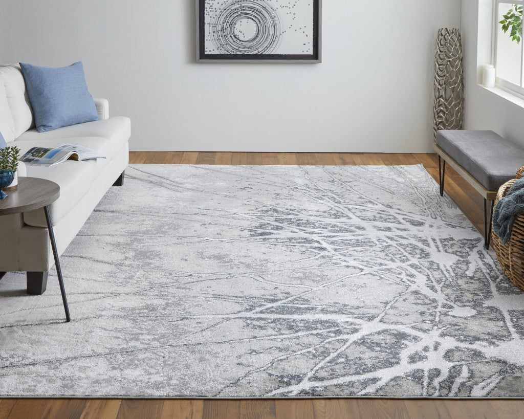 5' X 8' Gray Silver And Ivory Abstract Power Loom Area Rug