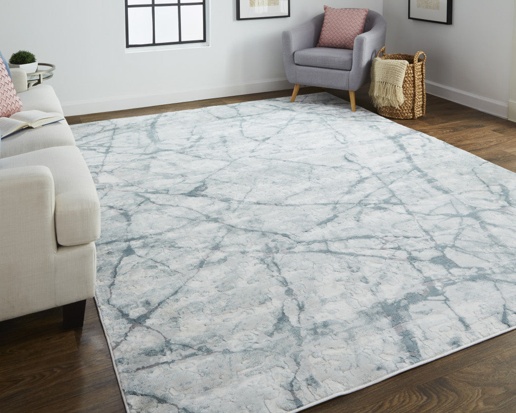 2' X 3' Blue Gray And Ivory Abstract Distressed Stain Resistant Area Rug