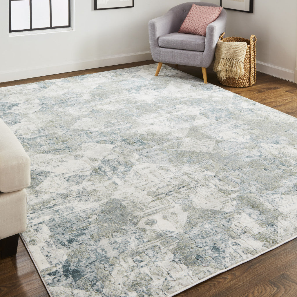 5' X 8' Green And Ivory Patchwork Distressed Stain Resistant Area Rug