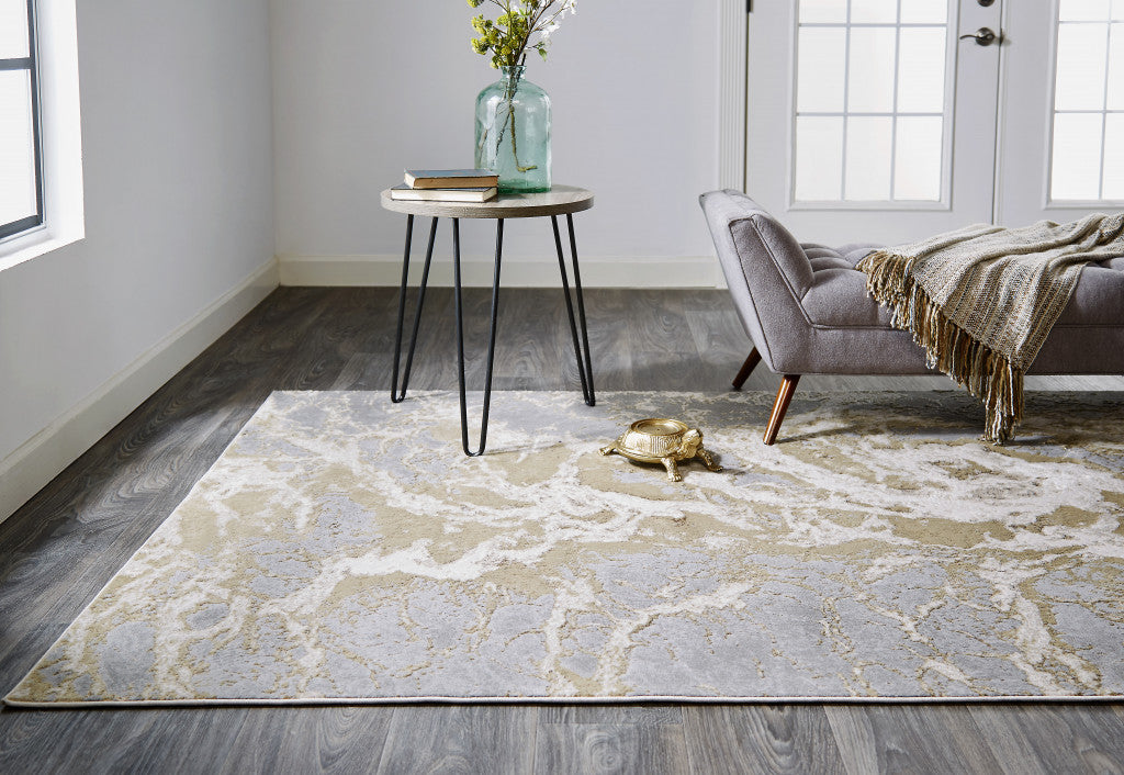 4' X 6' Ivory Silver And Gold Abstract Area Rug