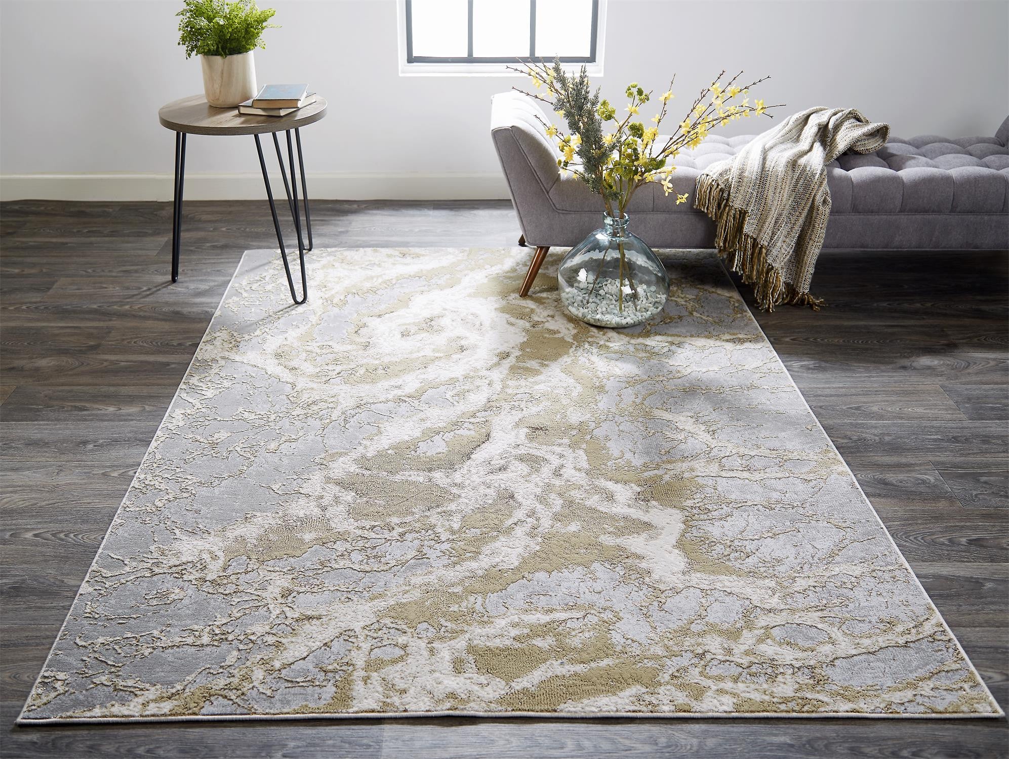 5' X 8' Ivory Silver And Gold Abstract Stain Resistant Area Rug