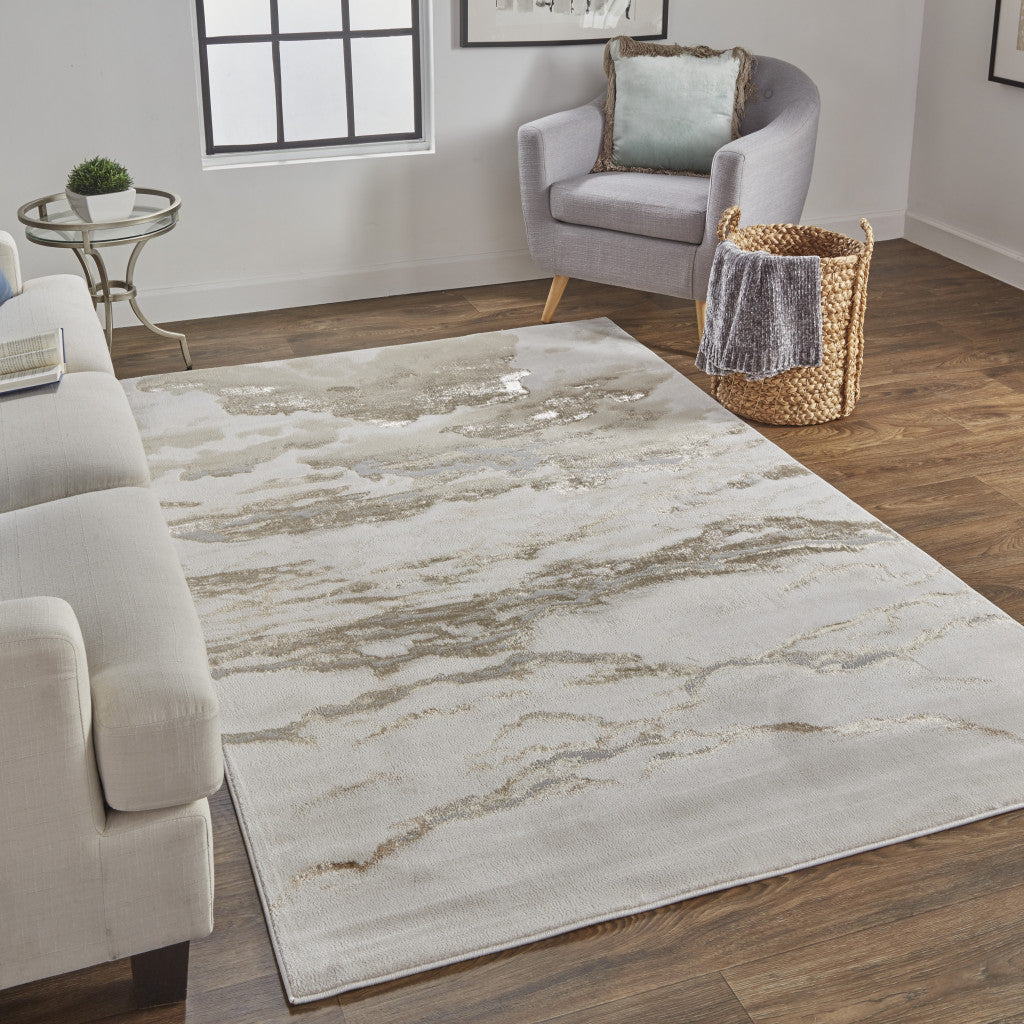 5' X 8' Ivory Tan And Gray Abstract Stain Resistant Area Rug