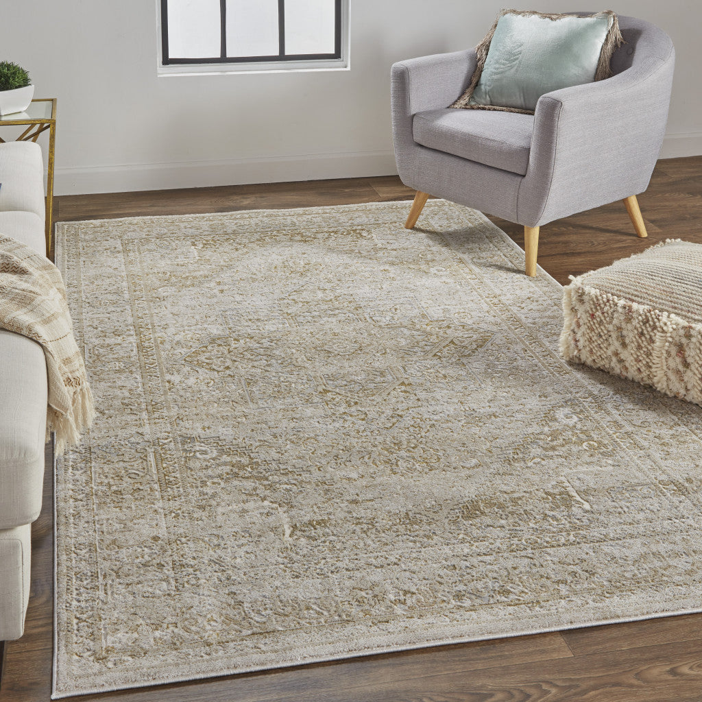 5' X 8' Ivory And Gold Floral Stain Resistant Area Rug