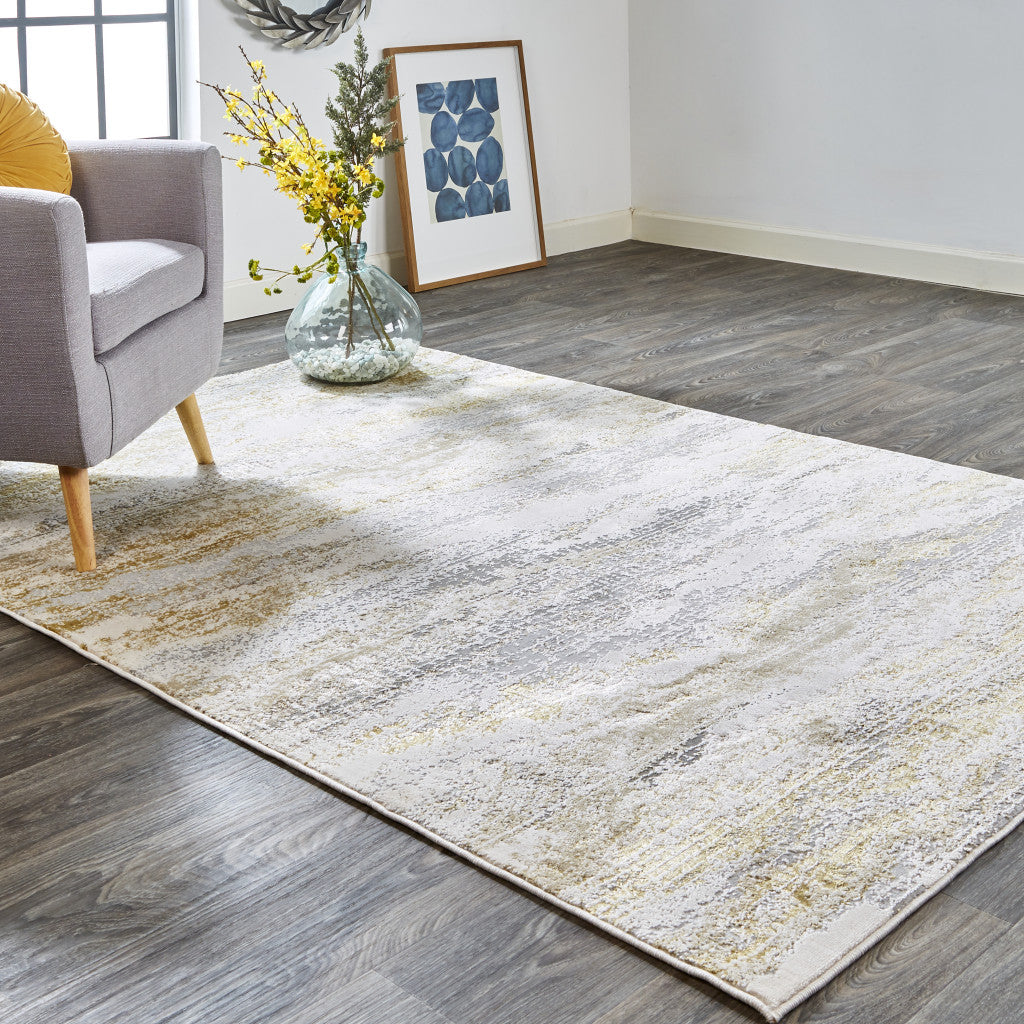 5' X 8' Gold Gray And Ivory Abstract Stain Resistant Area Rug