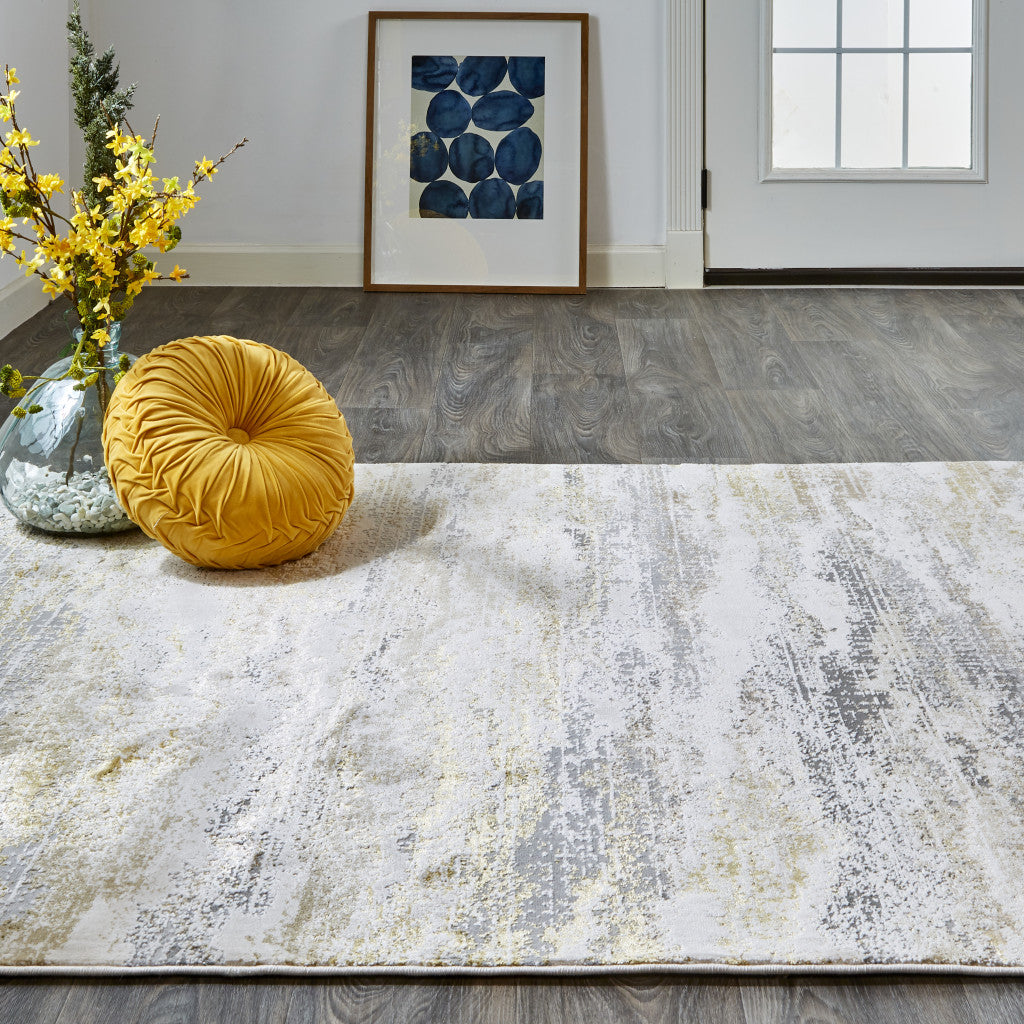 5' X 8' Gold Gray And Ivory Abstract Stain Resistant Area Rug