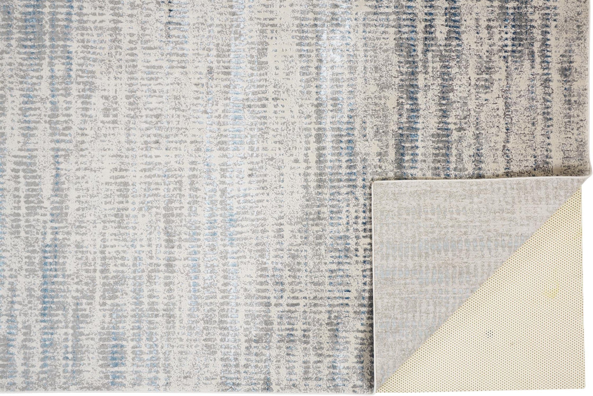 7' X 10' Blue Gray And Ivory Abstract Stain Resistant Area Rug