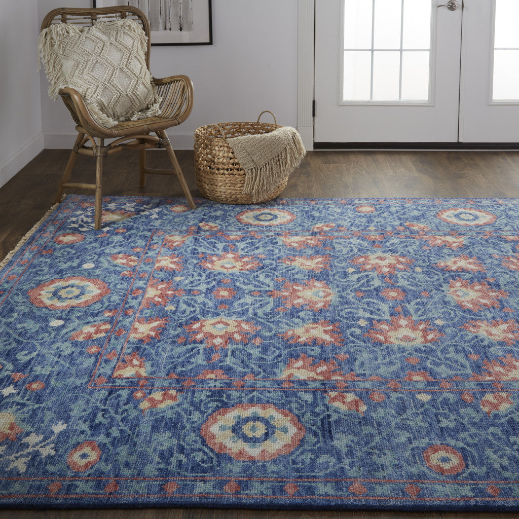 5' X 8' Blue And Red Wool Floral Hand Knotted Stain Resistant Area Rug