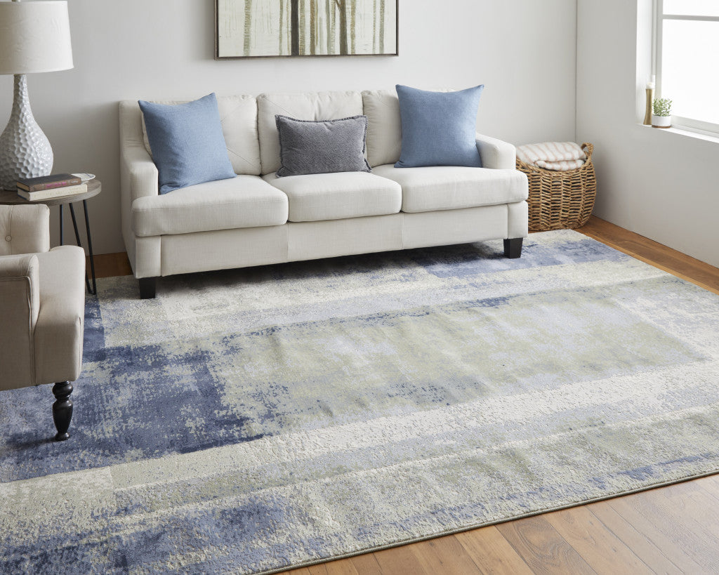 5' X 8' Blue Green And Ivory Abstract Power Loom Distressed Area Rug