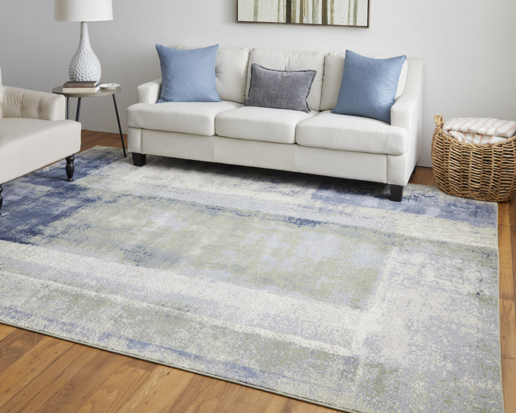 5' X 8' Blue Green And Ivory Abstract Power Loom Distressed Area Rug