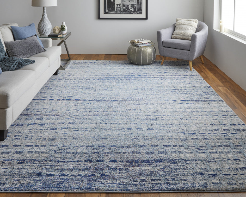 7' X 10' Blue And Ivory Abstract Power Loom Stain Resistant Area Rug