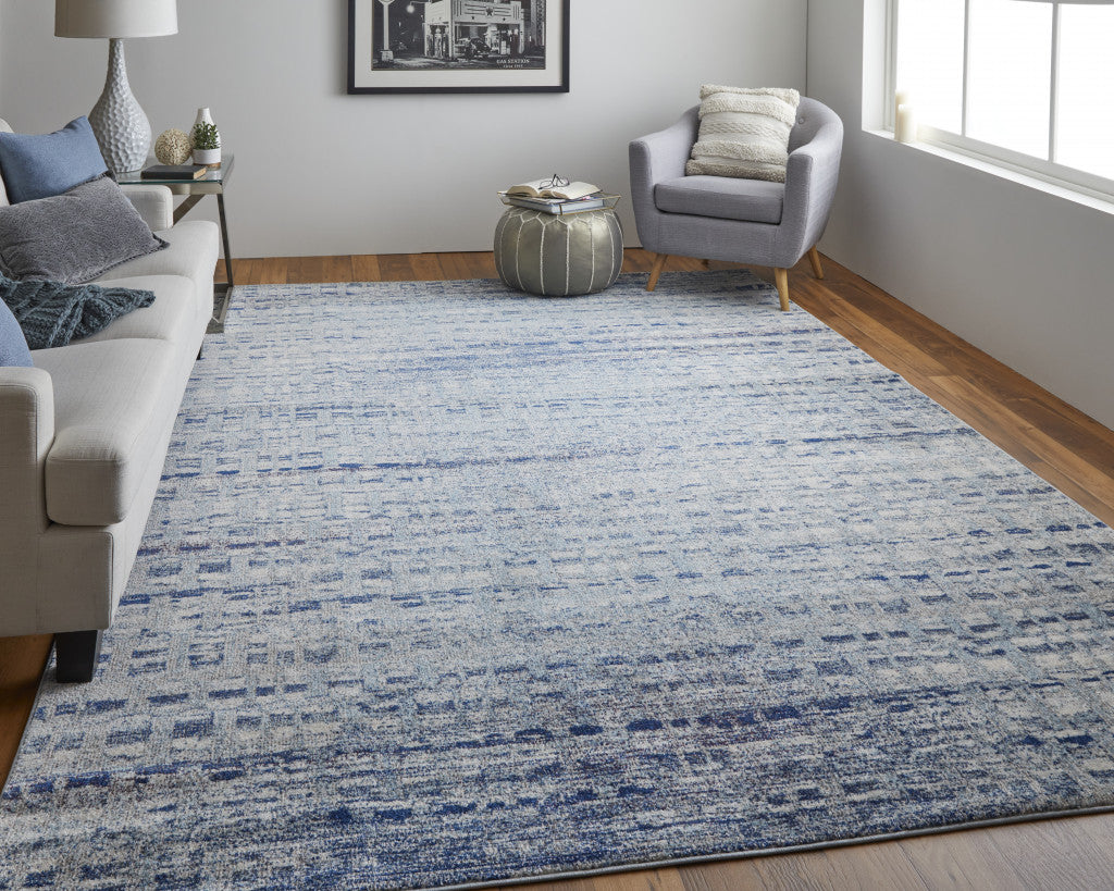 7' X 10' Blue And Ivory Abstract Power Loom Stain Resistant Area Rug