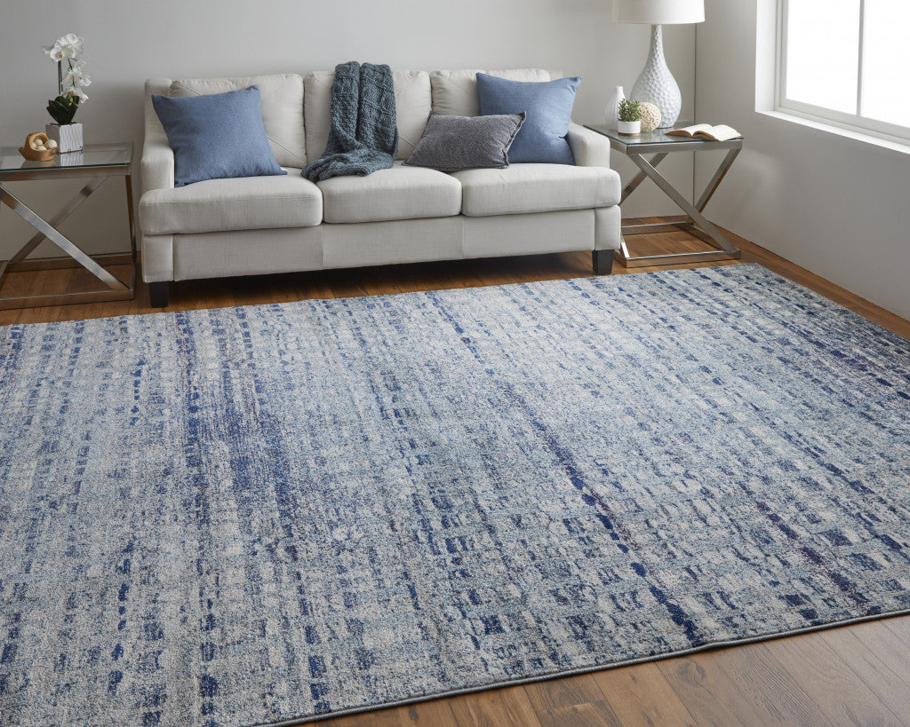 7' X 10' Blue And Ivory Abstract Power Loom Stain Resistant Area Rug