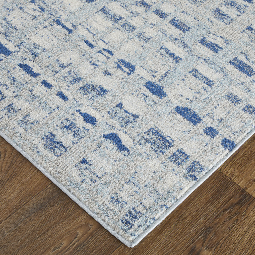 7' X 10' Blue And Ivory Abstract Power Loom Stain Resistant Area Rug