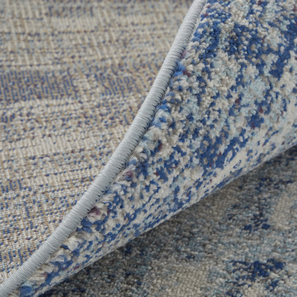 8' X 10' Blue And Ivory Abstract Power Loom Stain Resistant Area Rug