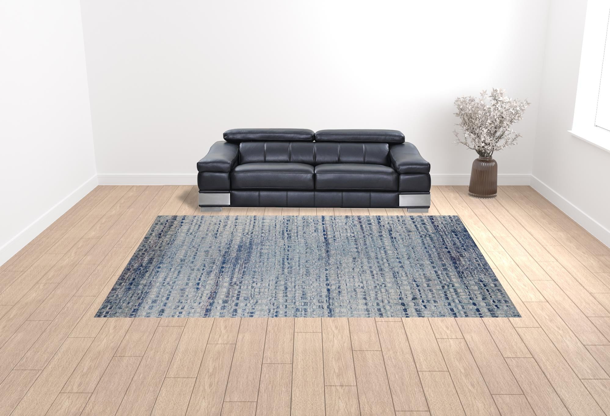 10' X 14' Blue And Ivory Abstract Power Loom Stain Resistant Area Rug